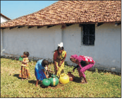 ashwas coverpic women and kids collecting water