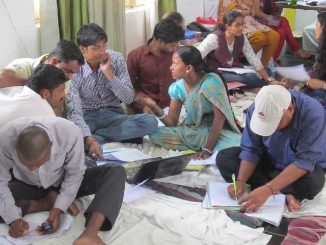 Participants working on a group assignment